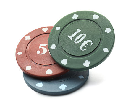 Chips for gambling games in casino on white background