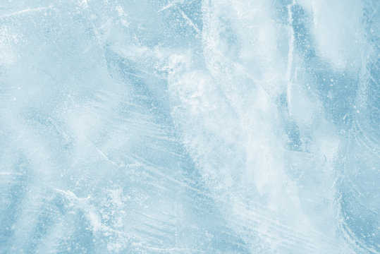 Ice background. Pattern of transparent shiny ice. Natural bright background