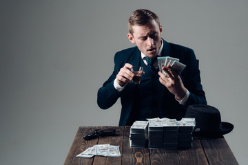 Small business concept. Man in suit. Mafia. Making money. Businessman work in accountant office. Economy and finance. Man bookkeeper. Money transaction. Rich and successful