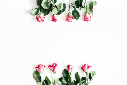 Flowers composition. Pink rose flowers on white background. Flat lay, top view, copy space
