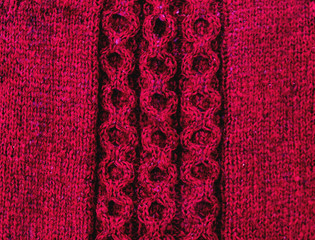 Red knitted cloth with a pattern