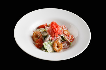 Fresh salad plate with shrimp, tomato and mixed greens
