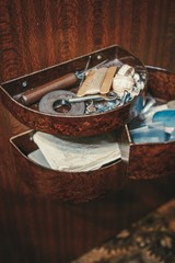 Sewing accessories are scattered on the shelf