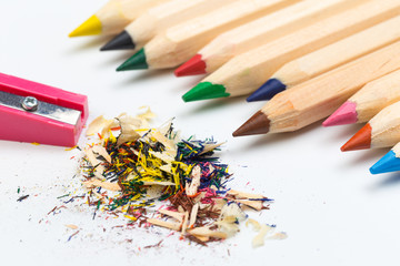 Wooden colorful pencils isolated on a white background, pencil sharpeners.