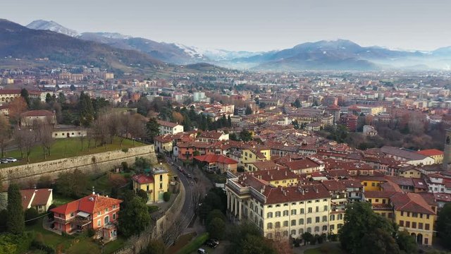 Aerial view of Bergamo cityscape and surrounding mountains, Italy