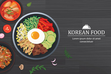 Bibimbap in the bowl on black wood table top view. Korea food background. - obrazy, fototapety, plakaty
