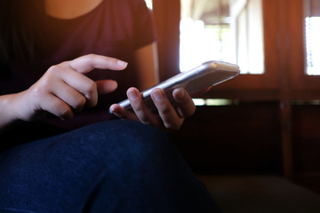 Obraz premium Women's hands holding cell telephone blank copy space screen. smart phone with technology concept.