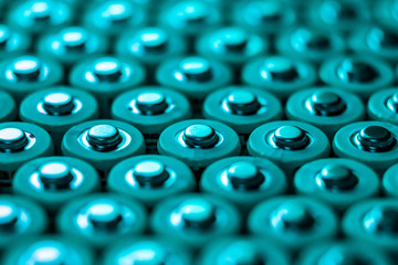 many lithium batteries under green light