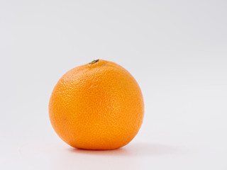 citrus fruit mandarin orange on white background with zest.