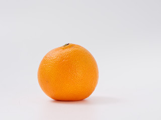 citrus fruit mandarin orange on white background with zest.