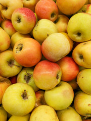 Ripe apples in the store as background