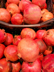 Ripe pomegranates on a shop window