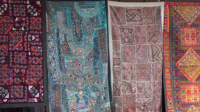 Patchwork carpet for sale in local market. Udaipur, Rajasthan, India. Close up