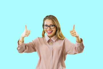 Portrait attractive girl stretched her arms forward and showed a class of gestures looking at camera on an isolated background