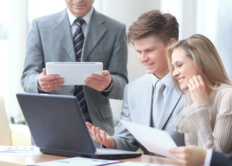 close up.businessman and business team analyzing financial data. photo with copy space