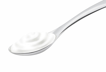 Silver spoon with yogurt / cream