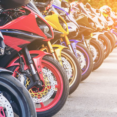 Motorcycles group parking on city street during adventure journey. Motorcyclists community travel...