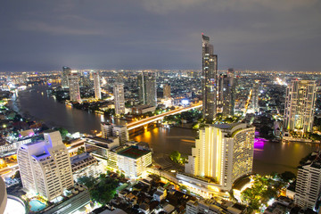 Obraz premium Aerial view Cityscape night Bangkok city skyline metropolis With Chao Phraya River in Thailand Asia