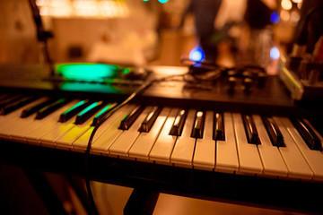 He plays piano on a bar