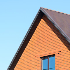 House with a roof made of metal sheets