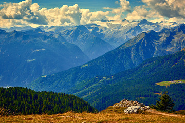 Fototapeta premium Panoramic view of theMountains around Madonna di Campiglio Madonna di Campiglio in the summertime, Italy,Northern & Central Brenta mountain groups ,Western Dolomites, Trentino-Alto Adige, Italy