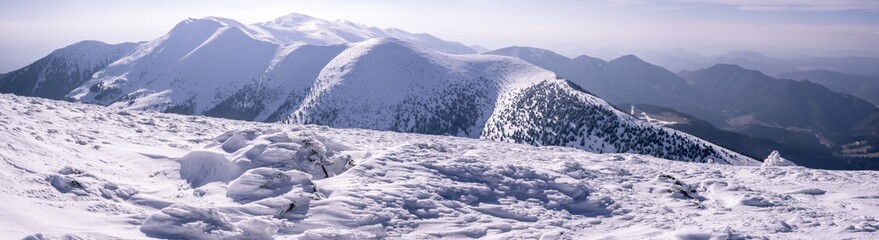 Panorama of rocky mountains in winter