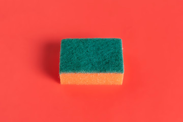 sponge for washing dishes isolated on colorful background b
