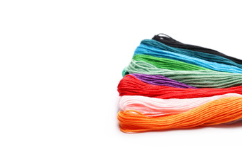 Colorful string for sewing and knitting, isolated on white background