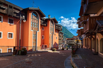 Fototapeta na wymiar MADONNA DI CAMPIGLIO, ITALY-20 October 2018:Madonna di Campiglio's main square in the summertime, Madonna di Campiglia is the most famous ski resort in the Dolomites, Italy.