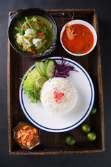 Fish fillet green curry set meal in a wood pan