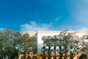 SEVILLA, SPAIN - January 13, 2018: Andalusia style building in Sevilla city, Spain