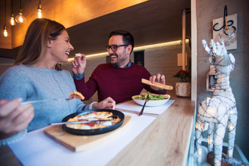 Couple at restaurant.