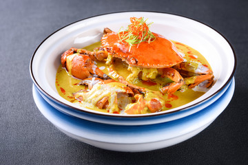Grilled sea crab with cheese in a white dish