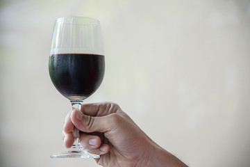 Man hold glass of wine - toast celebration concept