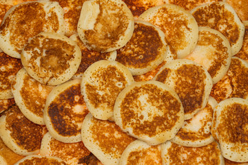 surface of delicious baking pancakes as background