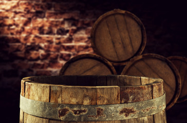 retro photo of barrels and wall with shadow 