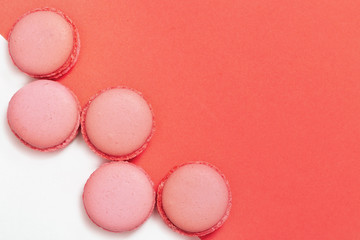 French macarons. Sweet dessert. Food backgrond. Macaroons cake on paper fon.