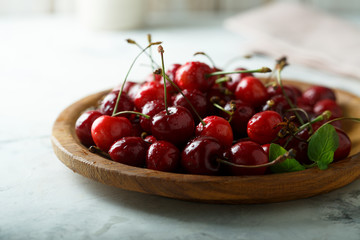 Fresh cherry on wooden desk