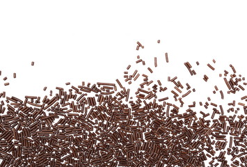 Chocolate sprinkles isolated on white background and texture, top view
