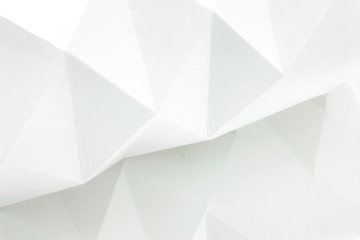 white origami background reflected in mirror 