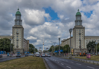 Fototapeta premium Berlin, Germany - main avenue during of the GDR (East Germany), Karl Marx Allee presents many beautiful buildings. Here in particular an example of its socialist architecture