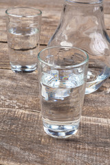 Glass of water on a wooden table