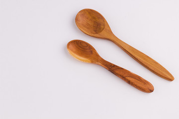 top view of a spoon of sandal wood  on light  background