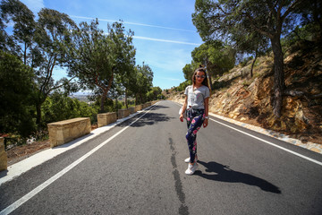 young woman on the road
