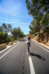 Obraz premium young woman on the road