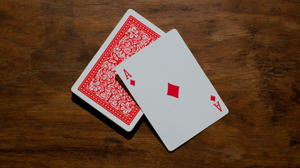 playing cards on wood table