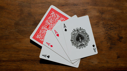 playing cards on wood table