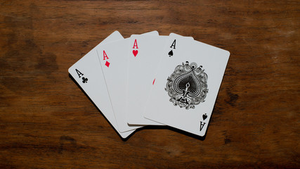 Obraz premium playing cards on wood table