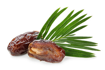 Sweet dried dates on white background