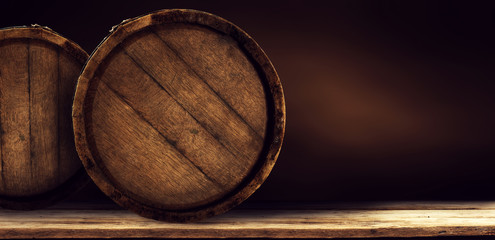 Wooden retro old barrel on desk and free space for your decoration  - obrazy, fototapety, plakaty